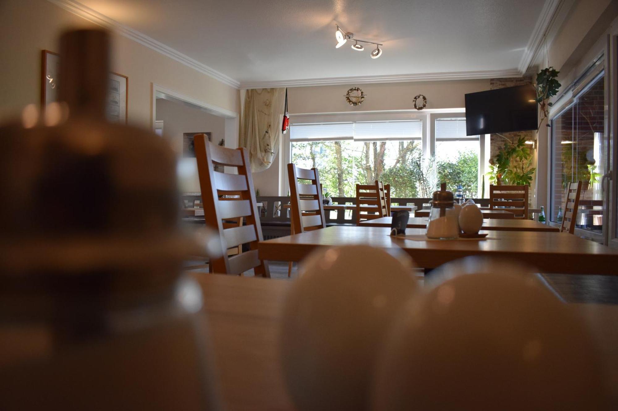 Hotel Haus Am Meer Бюзум Экстерьер фото
